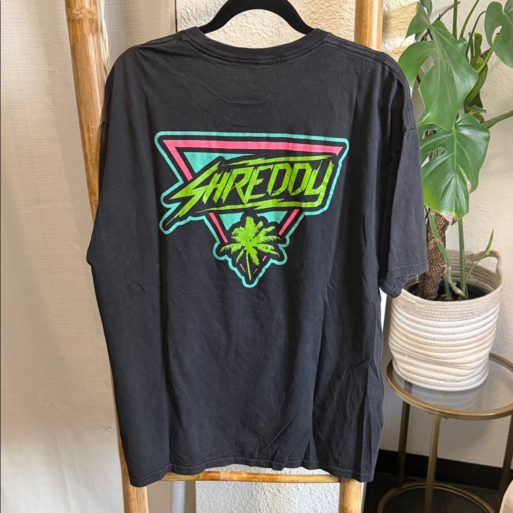 Black Graphic Tee with Green Accents